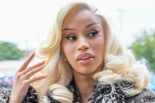Cardi B denies scratching and spitting on security guard