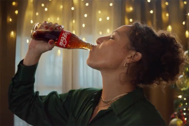 Coca-Cola branding displayed alongside discussions about Studio.One, WPP Open X, and the changing dynamics of global advertising agency relationships.
